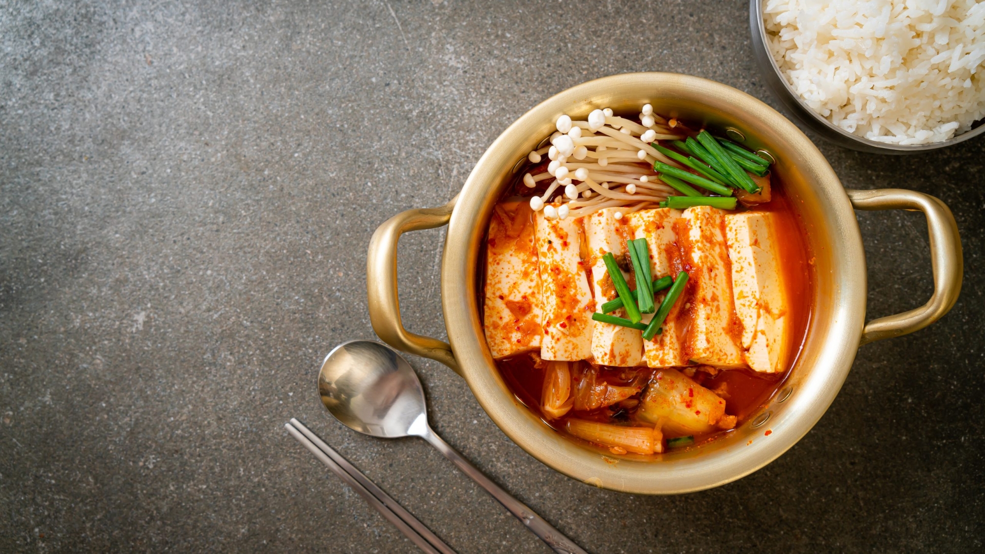 ‘Kimchi Jjigae’ or Kimchi Soup with Soft Tofu or Korean Kimchi Stew  - Korean Food Traditional Style